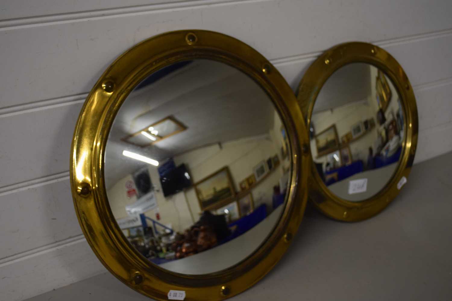 Lot 246 - TWO BRASS FRAMED PORTHOLE MIRRORS