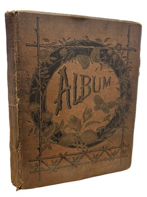 Lot 1099 - A vintage clothbound scrap album, each page...