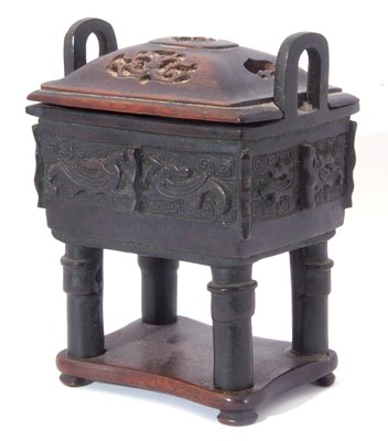 Lot 151 - Chinese bronze censer of archaic form, relief...