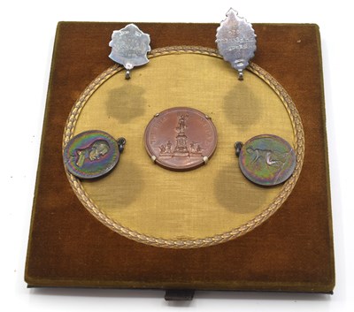 Lot 10 - Small framed display of miniatue shooting club...