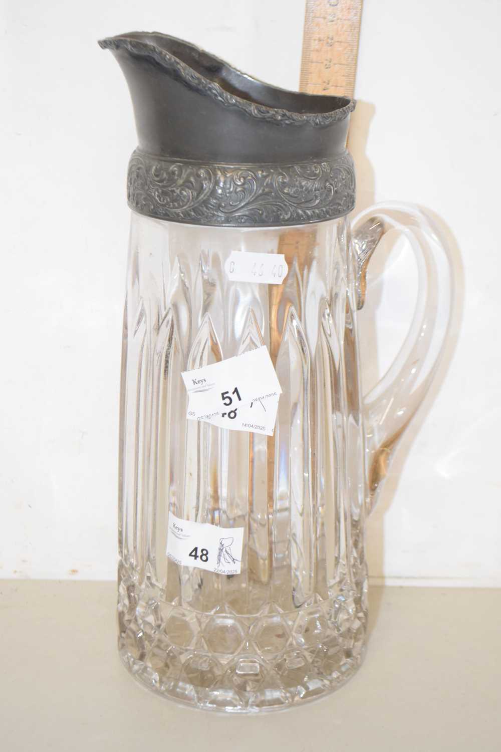 Lot 51 - A cut glass jug