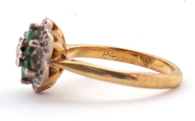 Lot 70 - An 18ct emerald and diamond cluster ring,...