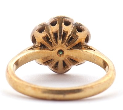 Lot 70 - An 18ct emerald and diamond cluster ring,...