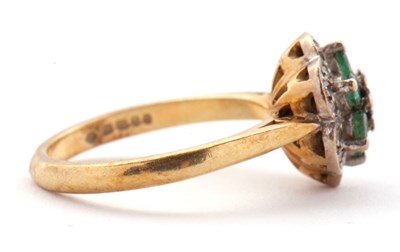 Lot 70 - An 18ct emerald and diamond cluster ring,...