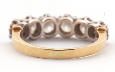 Lot 79 - An 18ct six stone diamond ring, the six round...