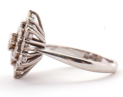 Lot 85 - An 18ct diamond cluster ring, set with round...
