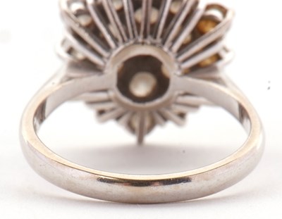 Lot 85 - An 18ct diamond cluster ring, set with round...