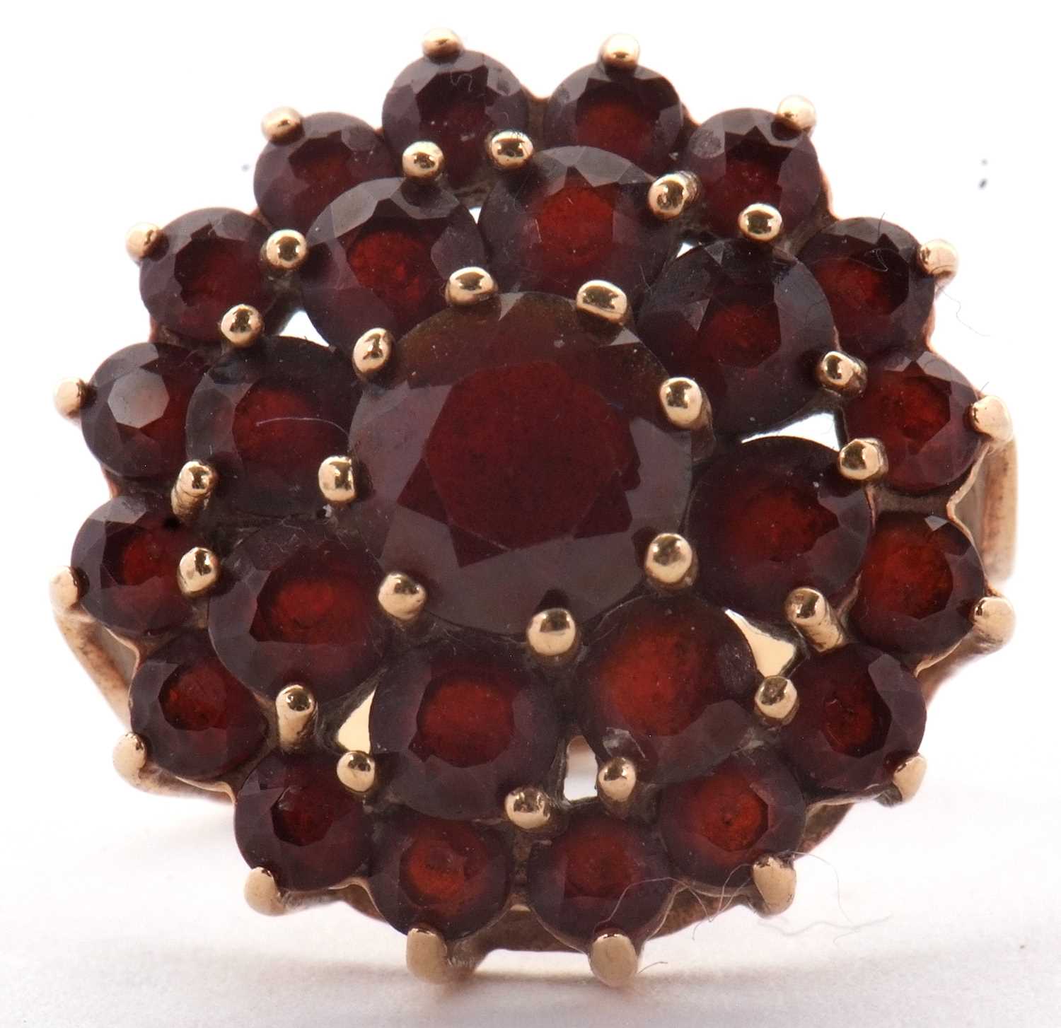 Lot 20 - A 9ct garnet cluster ring, set throughout with...