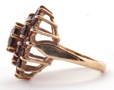 Lot 20 - A 9ct garnet cluster ring, set throughout with...