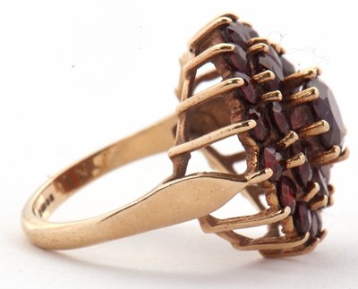 Lot 20 - A 9ct garnet cluster ring, set throughout with...