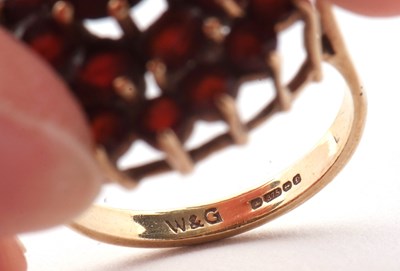 Lot 20 - A 9ct garnet cluster ring, set throughout with...