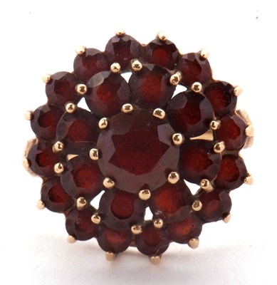 Lot 20 - A 9ct garnet cluster ring, set throughout with...