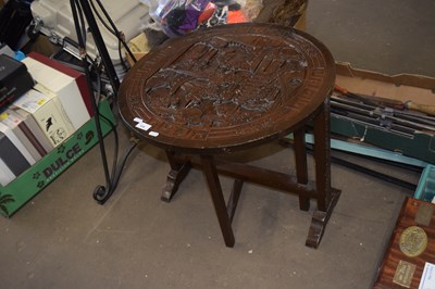 Lot 826 - Folding Oriental table with carved hardwood top