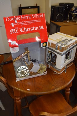 Lot 738 - Two electric Christmas carousel ornaments