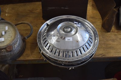 Lot 845 - Set of four vintage metal hub caps