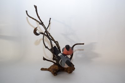 Lot 130 - Pottery model of two birds seated on branches