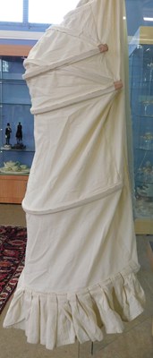 Lot 73 - Two reproduction calico bustle back crinoline...