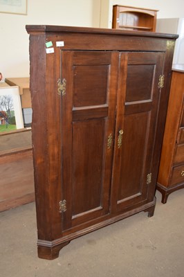 Lot 764 - A Georgian mahogany floor standing corner...