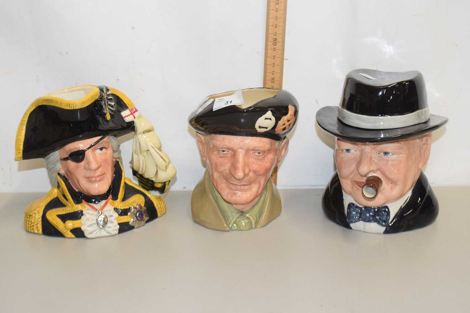 Lot 31 - Two Royal Doulton character jugs viz Vice...