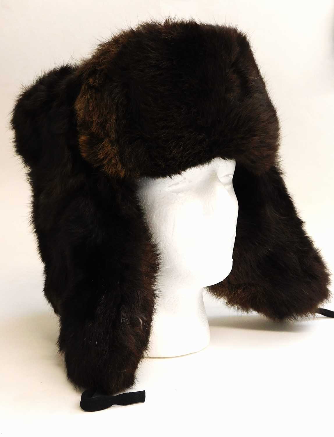 Lot 82 - A fur trapper hat, with Communist badge