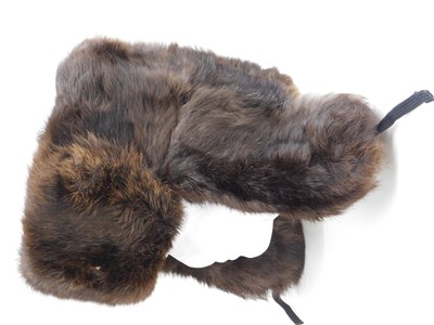 Lot 82 - A fur trapper hat, with Communist badge