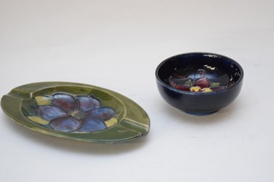 Lot 134 - Small Moorcroft pin dish with floral design on...