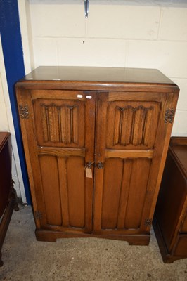 Lot 434 - MID-20TH CENTURY OAK DOUBLE DOOR TALLBOY...