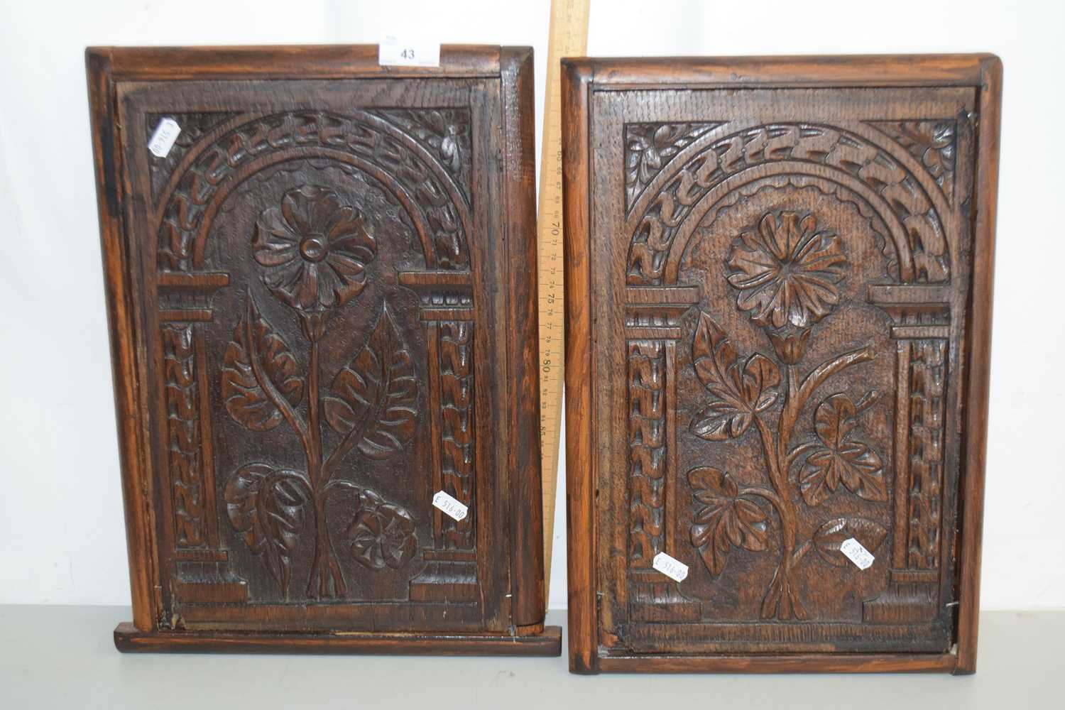 Lot 43 - A pair of carved oak panels