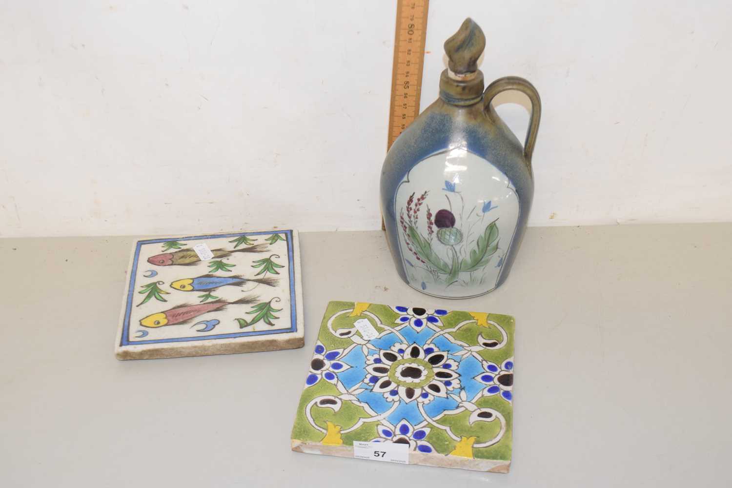 Lot 57 - Two 20th Century Kajar tiles together with a...