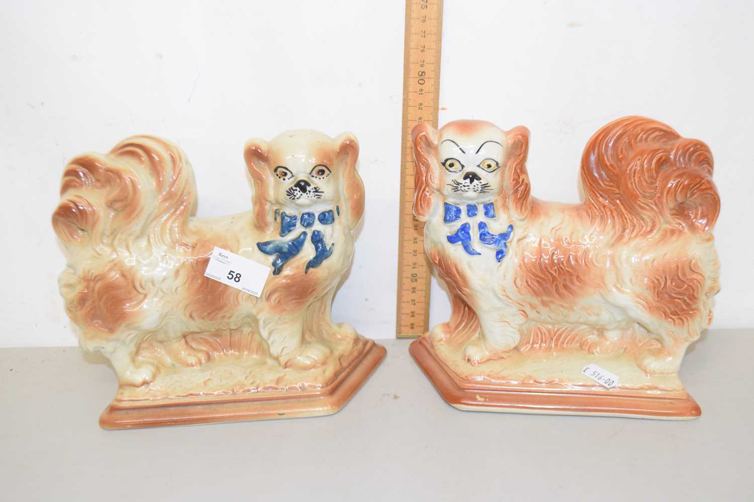 Lot 58 - A pair of Staffordshire models of Spaniels set...