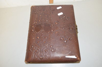 Lot 68 - A Victorian photograph album, part filled...