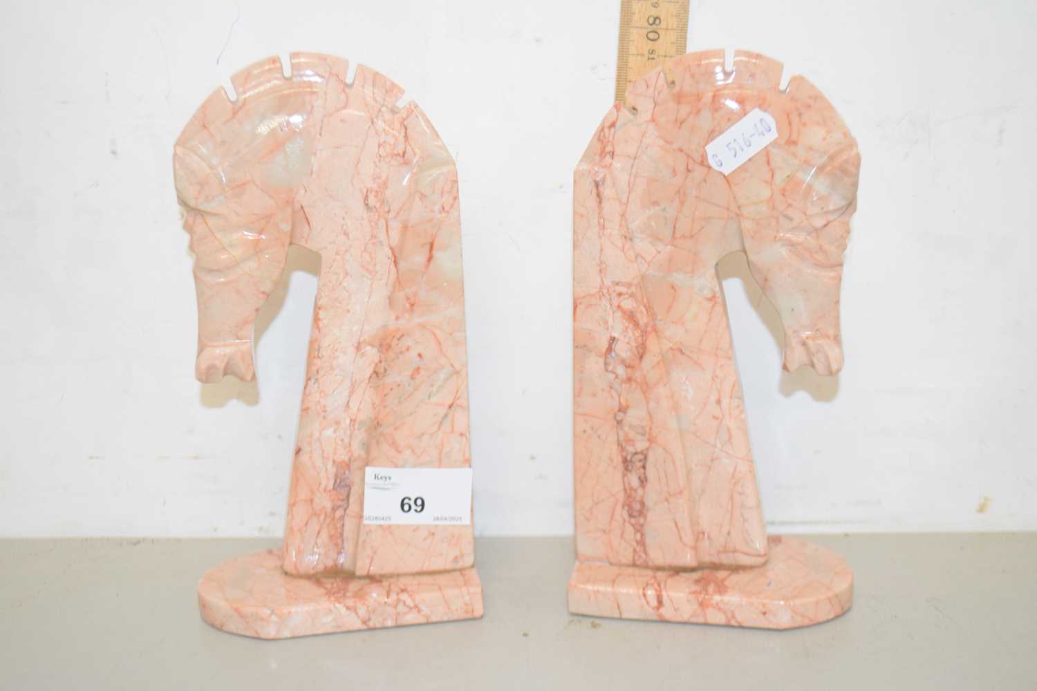 Lot 69 - A pair of polished marble horses head bookends