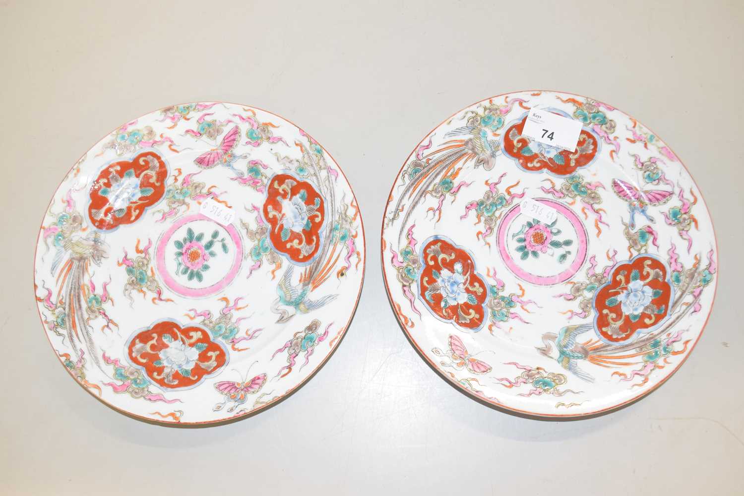 Lot 74 - A pair of Oriental porcelain plates decorated...