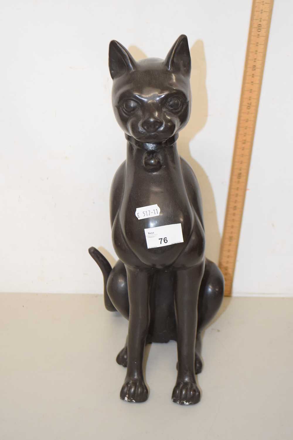 Lot 76 - A bronzed metal model of a seated cat, unsigned