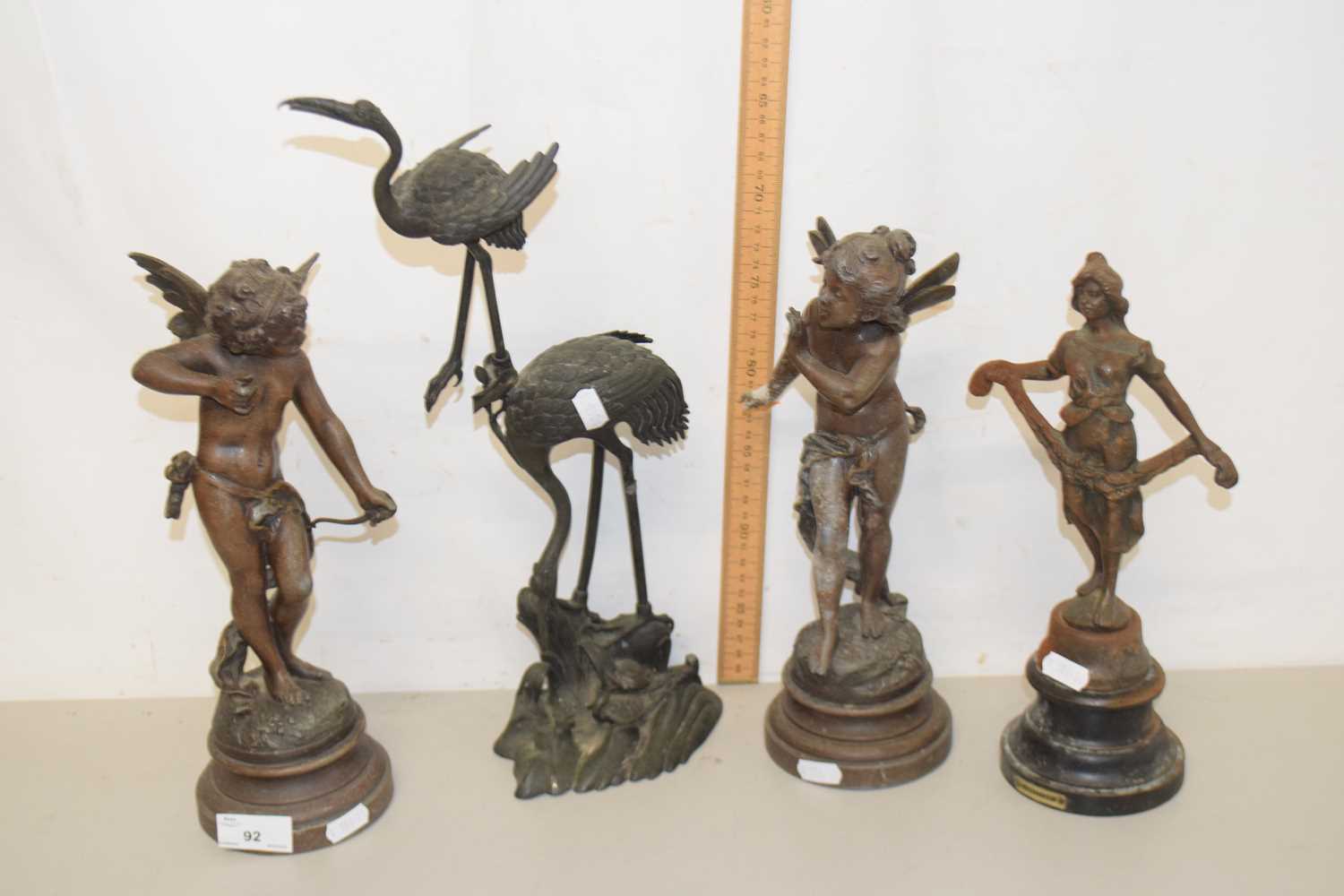 Lot 92 - A group of bronzed Spelter figures together...