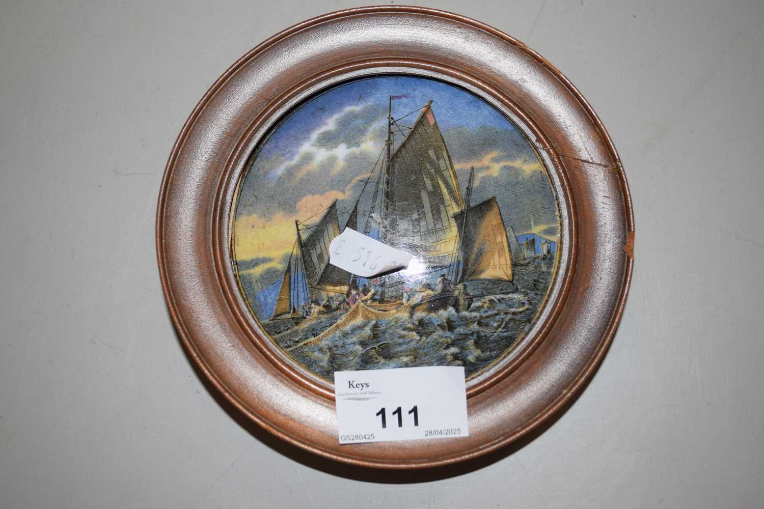 Lot 111 - A Pratt ware pot lid in frame
