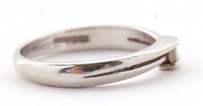Lot 27 - A 9ct diamond ring, the central round...