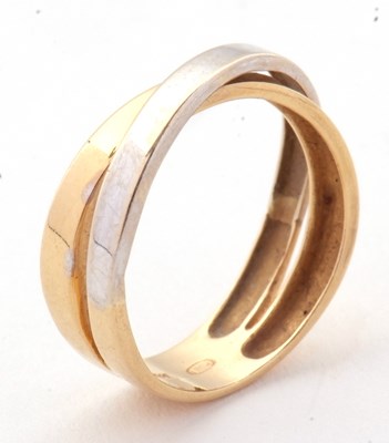 Lot 26 - A two tone gold ring, the white and yellow...