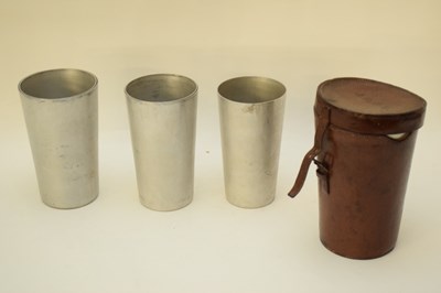 Lot 146 - Leather box containing silver metal cups