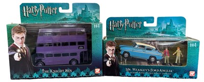 Lot 51 - A pair of boxed die-cast Corgi Harry Potter...