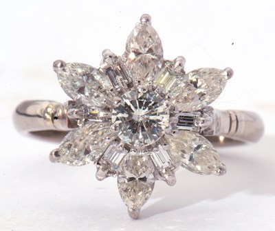 Lot 301 - Precious metal diamond star cluster ring...