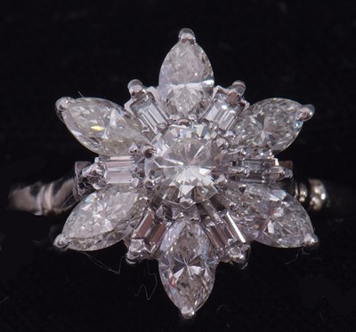 Lot 301 - Precious metal diamond star cluster ring...