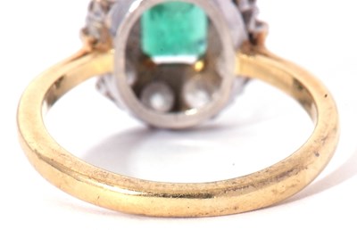 Lot 302 - Emerald and diamond cluster ring, the stepped...