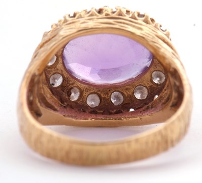 Lot 305 - 18ct gold amethyst and diamond ring, the oval...