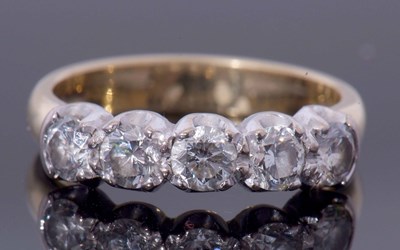 Lot 309 - Five-stone diamond ring featuring five round...