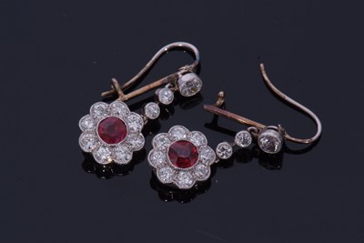 Lot 311 - Pair of ruby and diamond drop earrings...