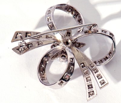 Lot 223 - 18ct white gold and diamond set floral and...
