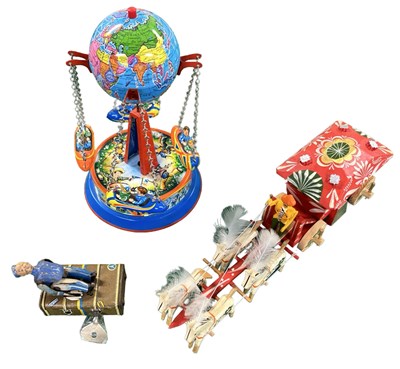Lot 283 - A pair of German tinplate toys, together with...