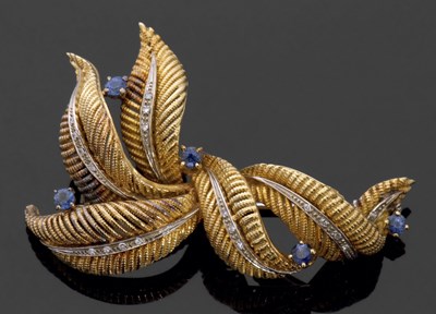 Lot 322 - Diamond and sapphire set leaf decorated brooch,...