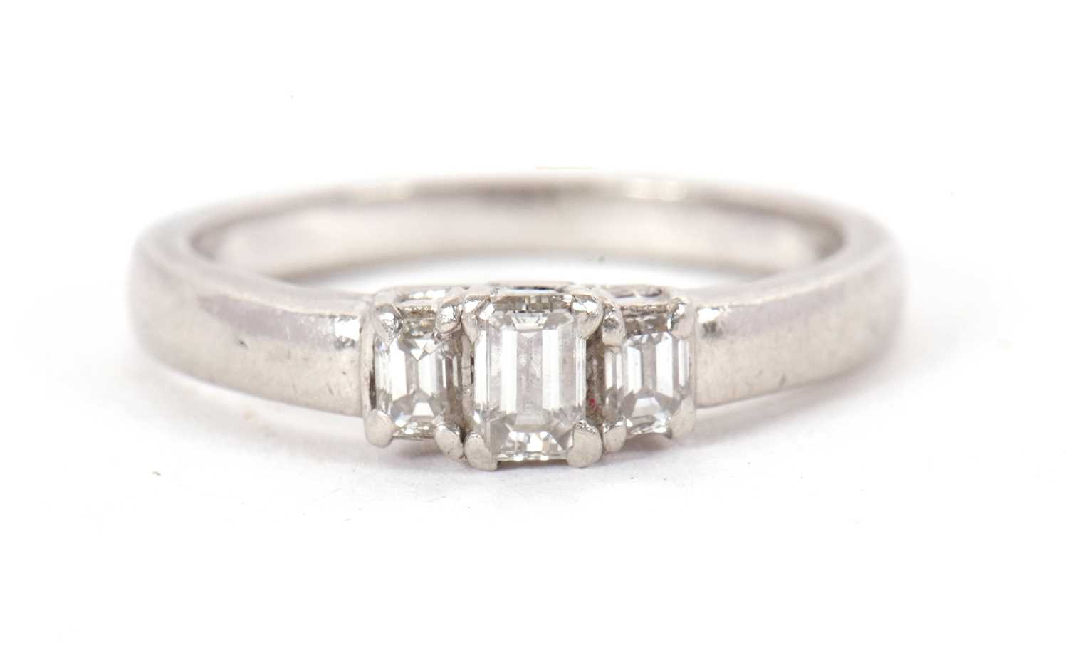 Lot 1 - A platinum and diamond ring, the three...